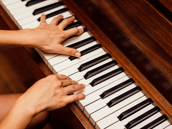 How often should adults take piano lessons